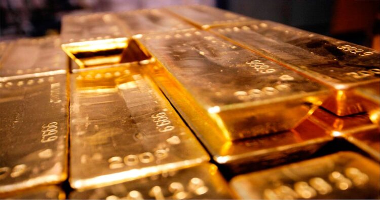 Una imagen de lingotes de oro.