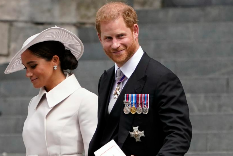 El príncipe Enrique y su esposa Meghan Markle. Foto: Alberto Pezzali.