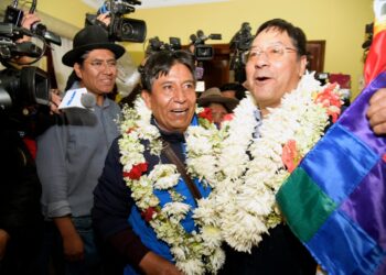 Luis Arce y David Choquehuanca festejan su victoria el 18 de octubre de 2020.
