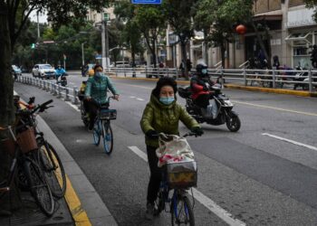 China anuncia relajamiento general de restricciones por COVID-19