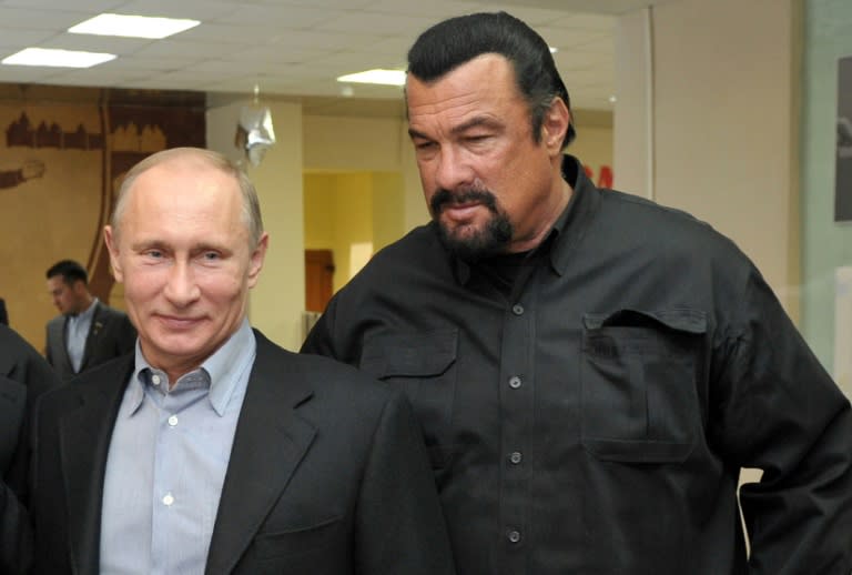 El presidente ruso, Vladimir Putin, y el actor norteamericano Steven Seagal el 13 de marzo de 2013 en una escuela de catch en Moscú. Foto: AFP.